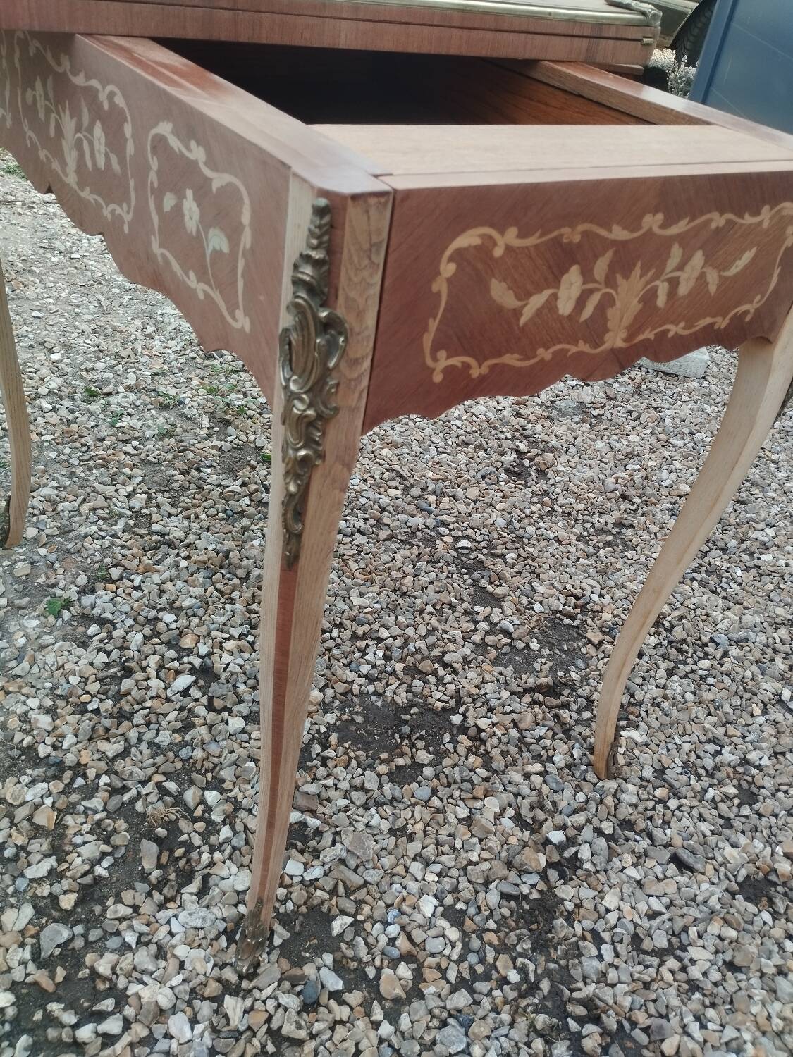 Antique game table in Louis XVI style with marquetry.