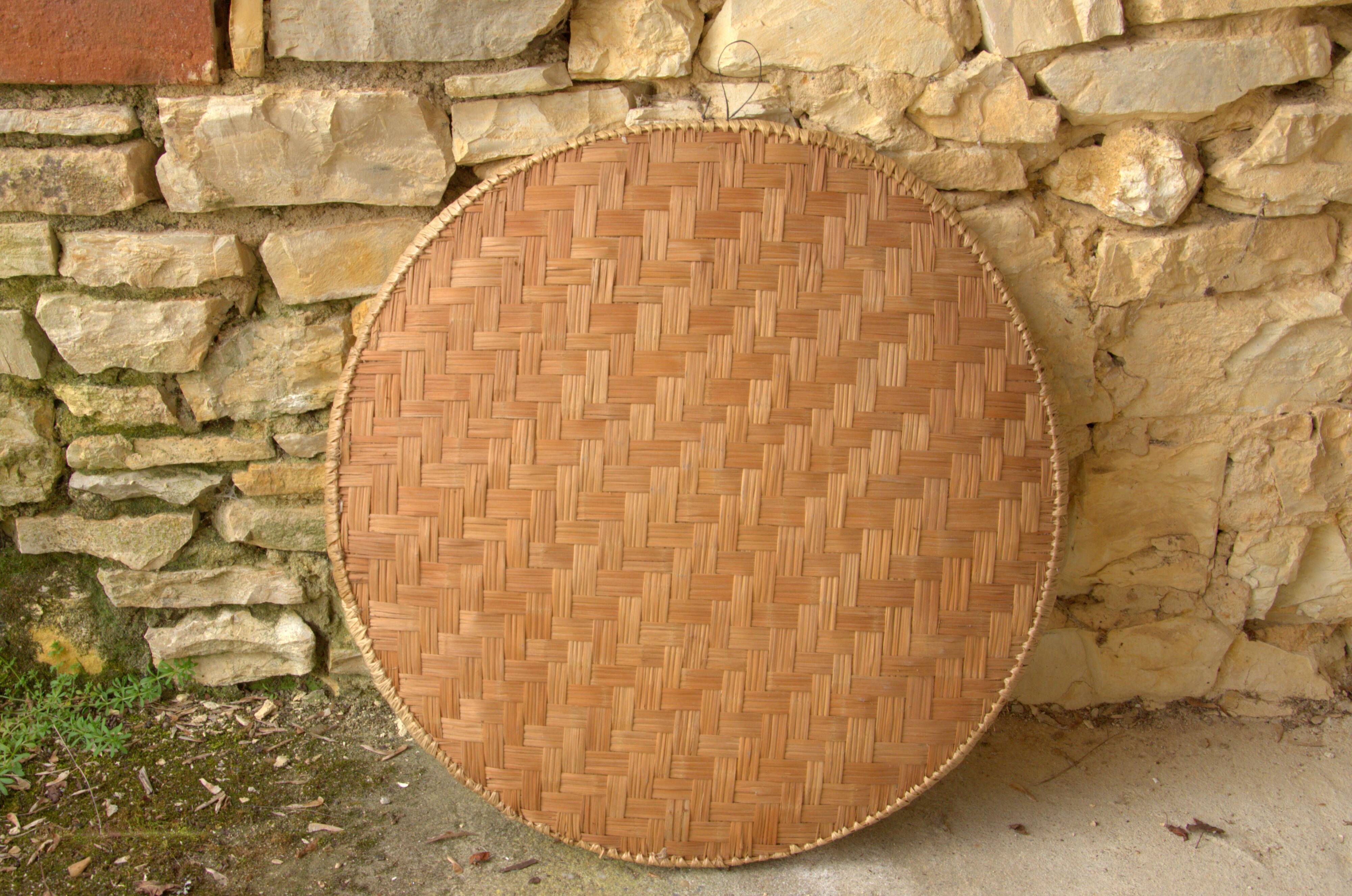Large rice plate made of wicker, originating from Cambodia, 66cm.