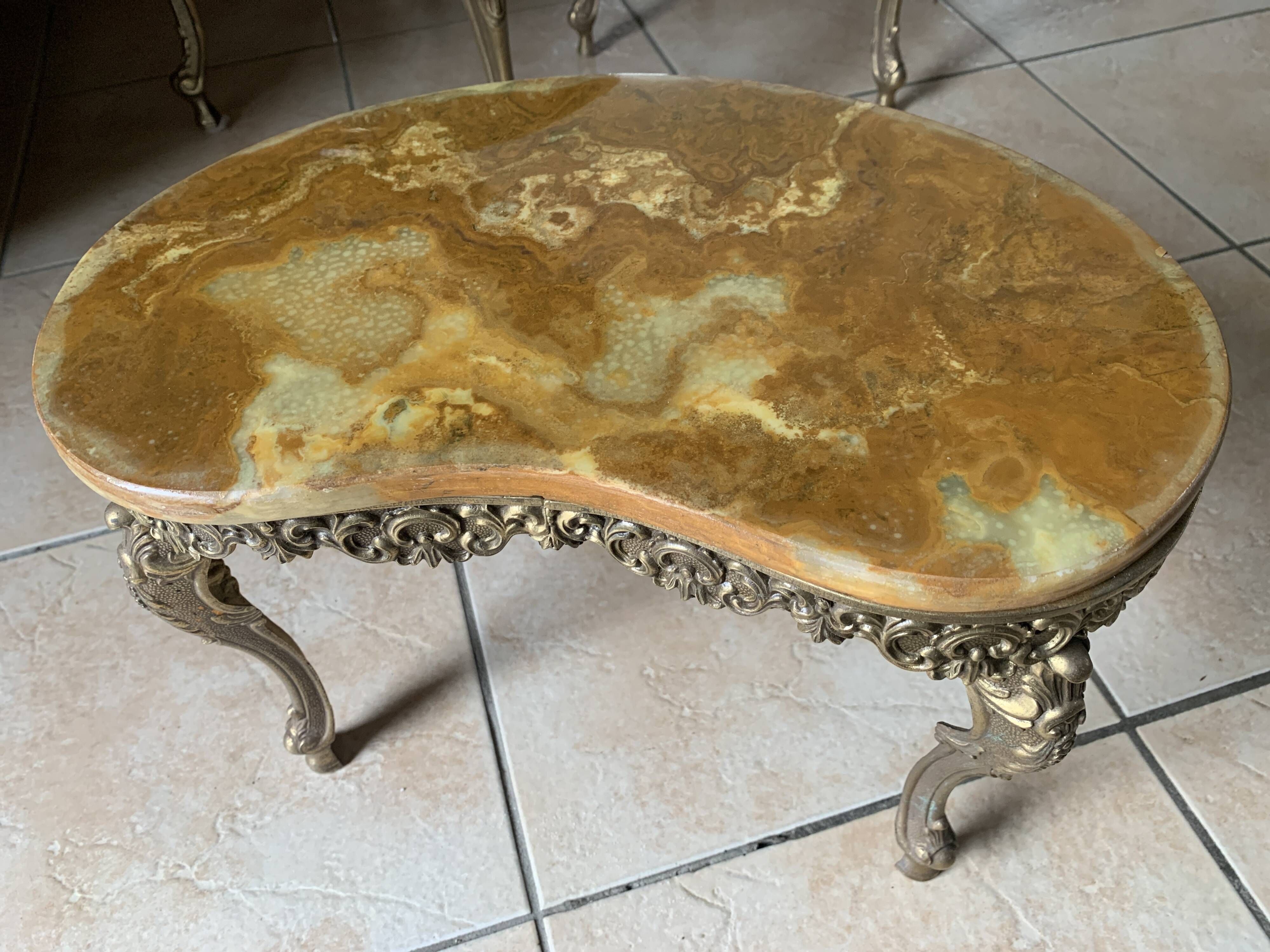 Lot of 3 marble and brass nesting tables.
