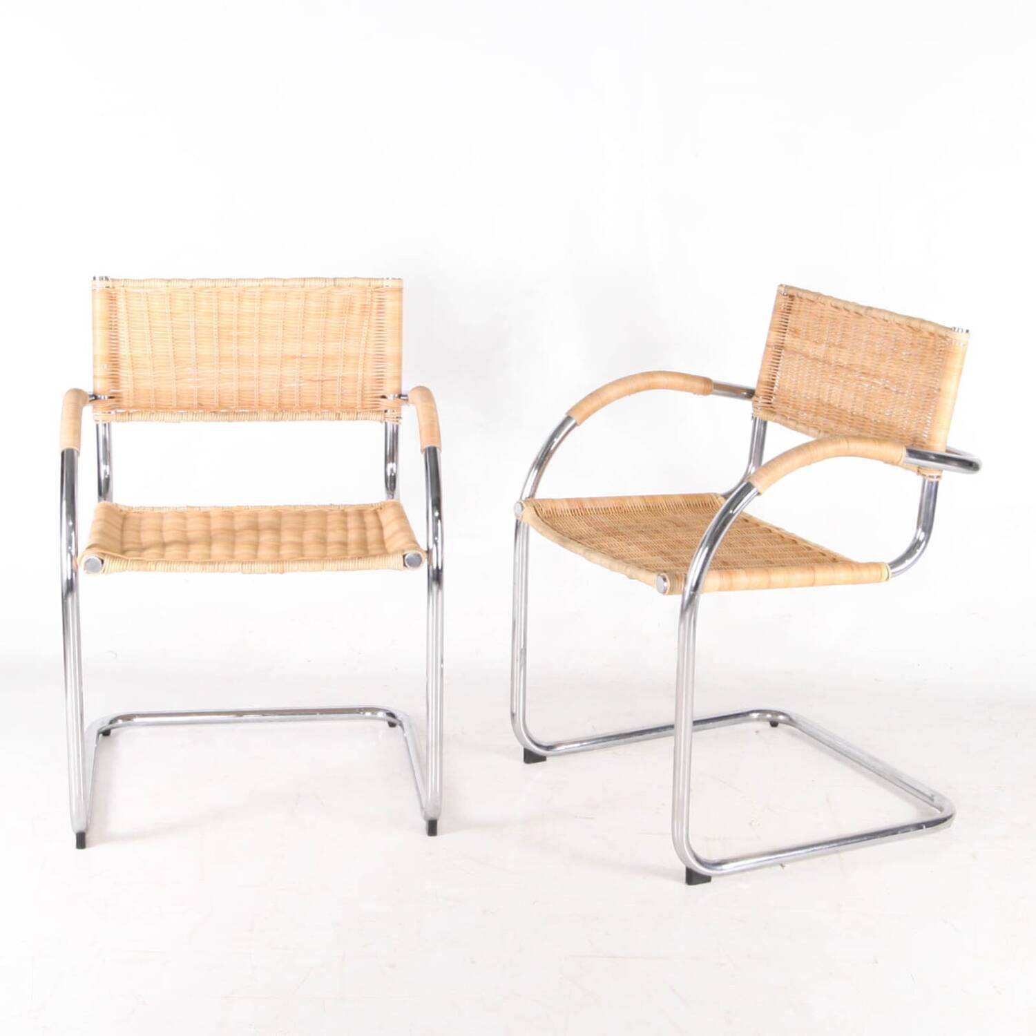 Pair of wicker and metal armchairs