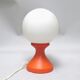 Small 1970s orange tulip-shaped ball lamp on a stand