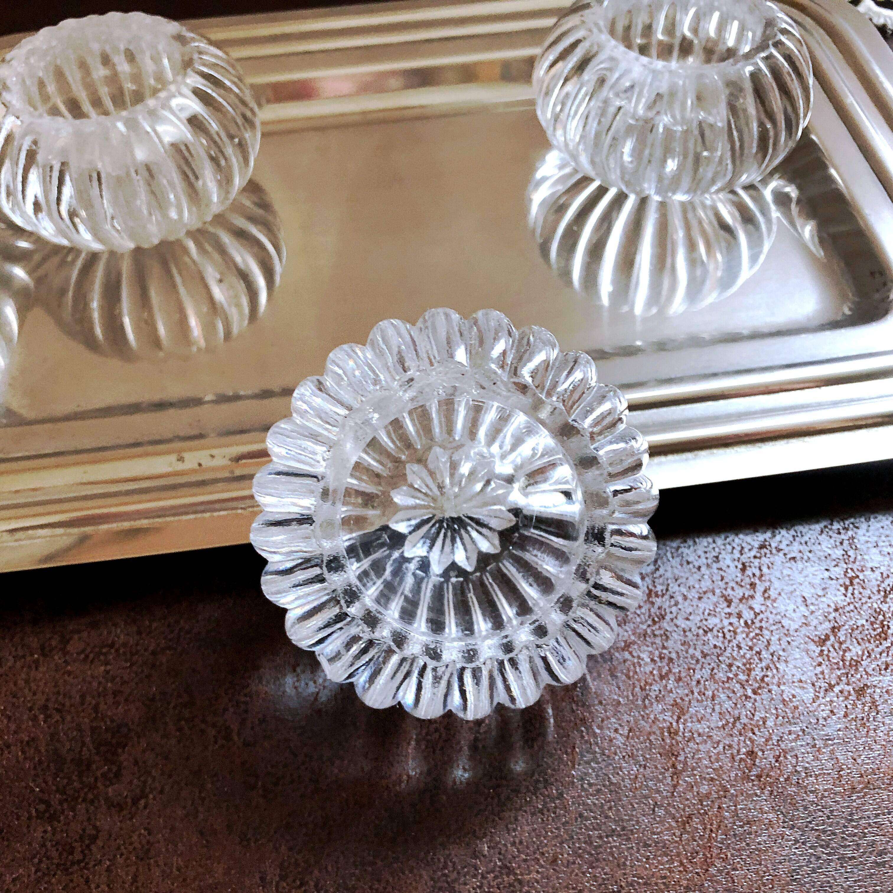 Trio of salt shakers, pepper shakers, molded glass salt shakers