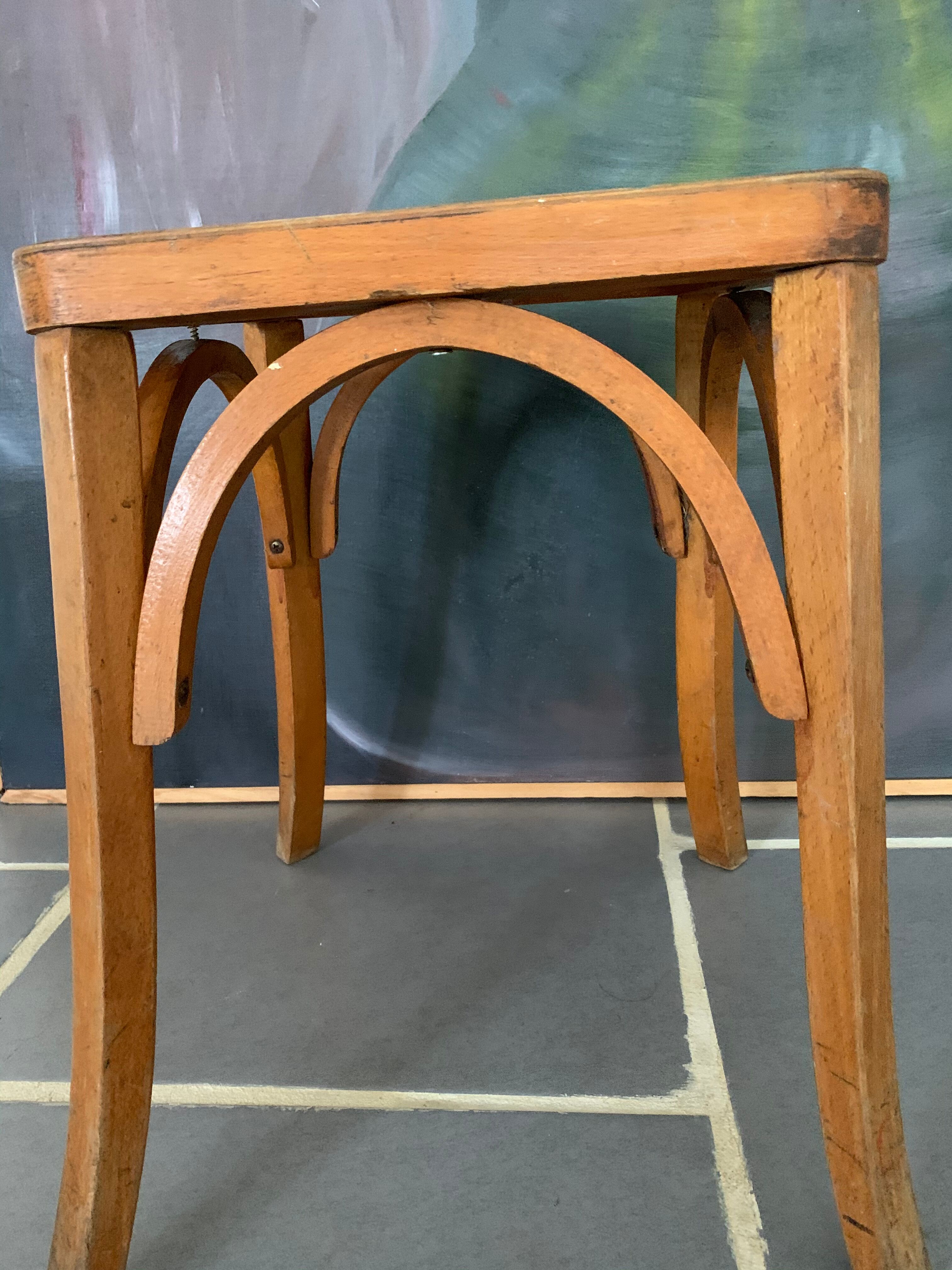Vintage curved wooden stool