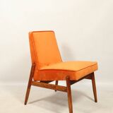 Papaya orange velvet mid century modern 1970s renovated armchair