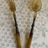 Horn and metal salad servers from the 1920s