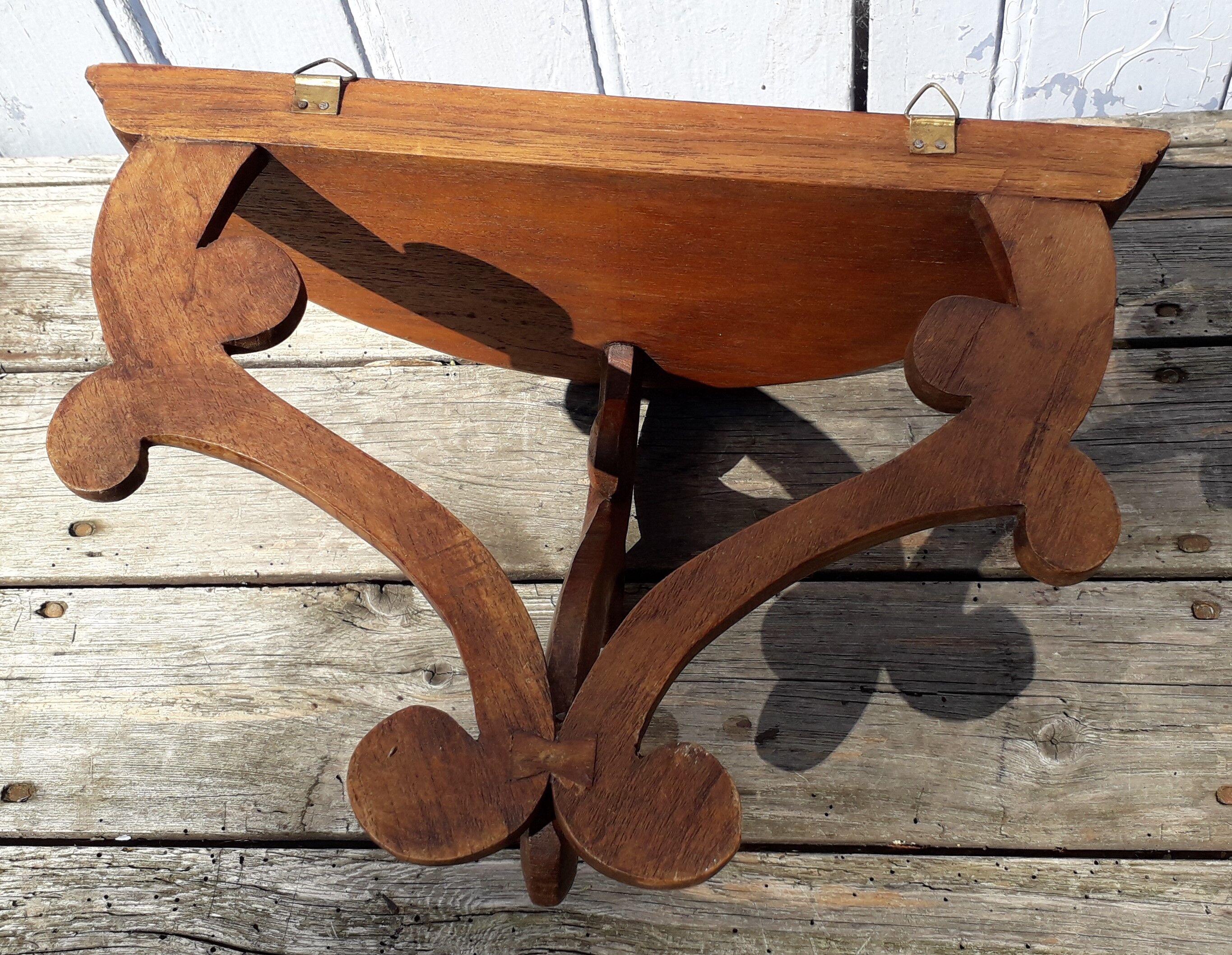 Carved wooden console shelf