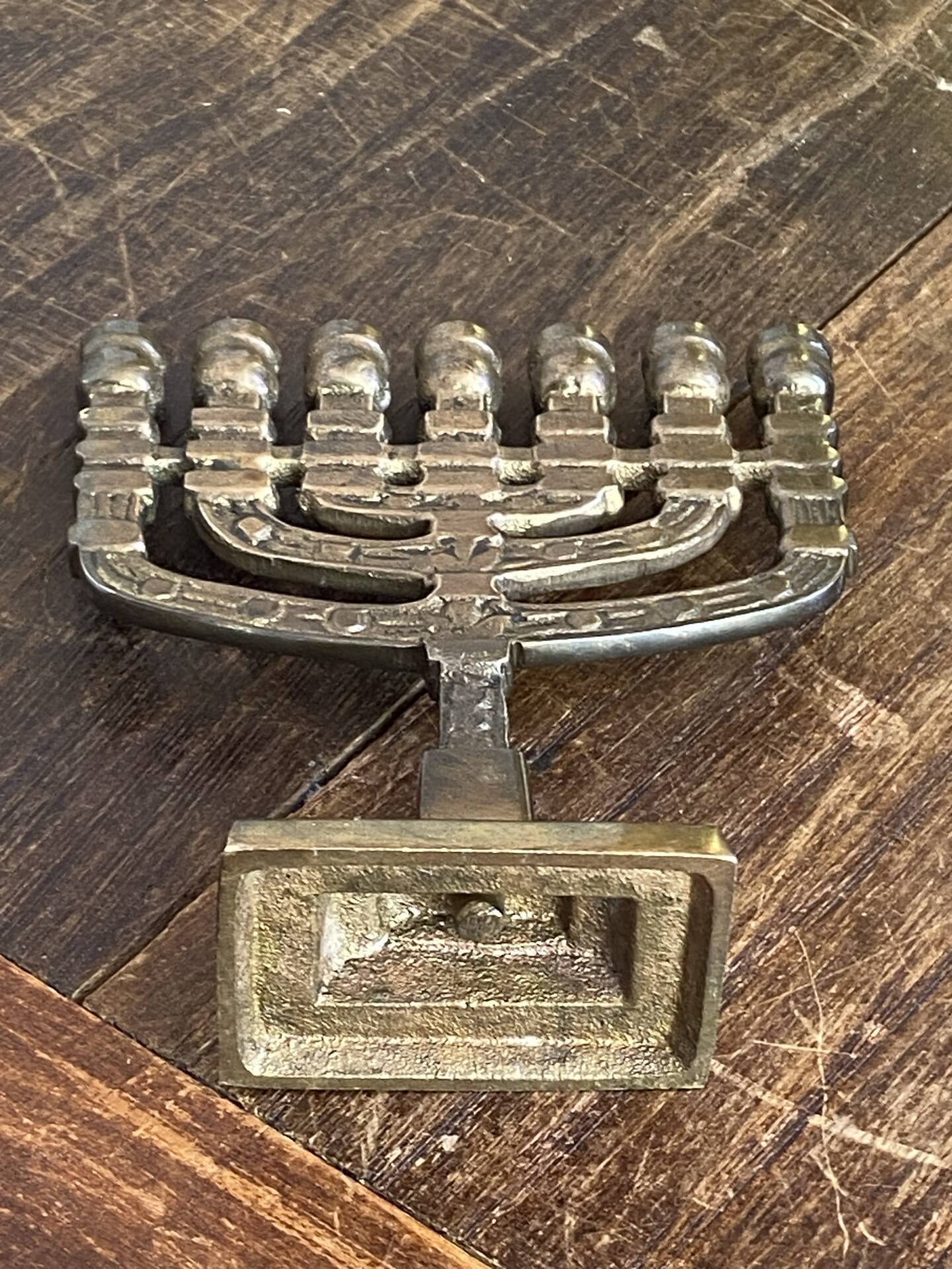 Chandelier, seven-branched menorah, in brass.