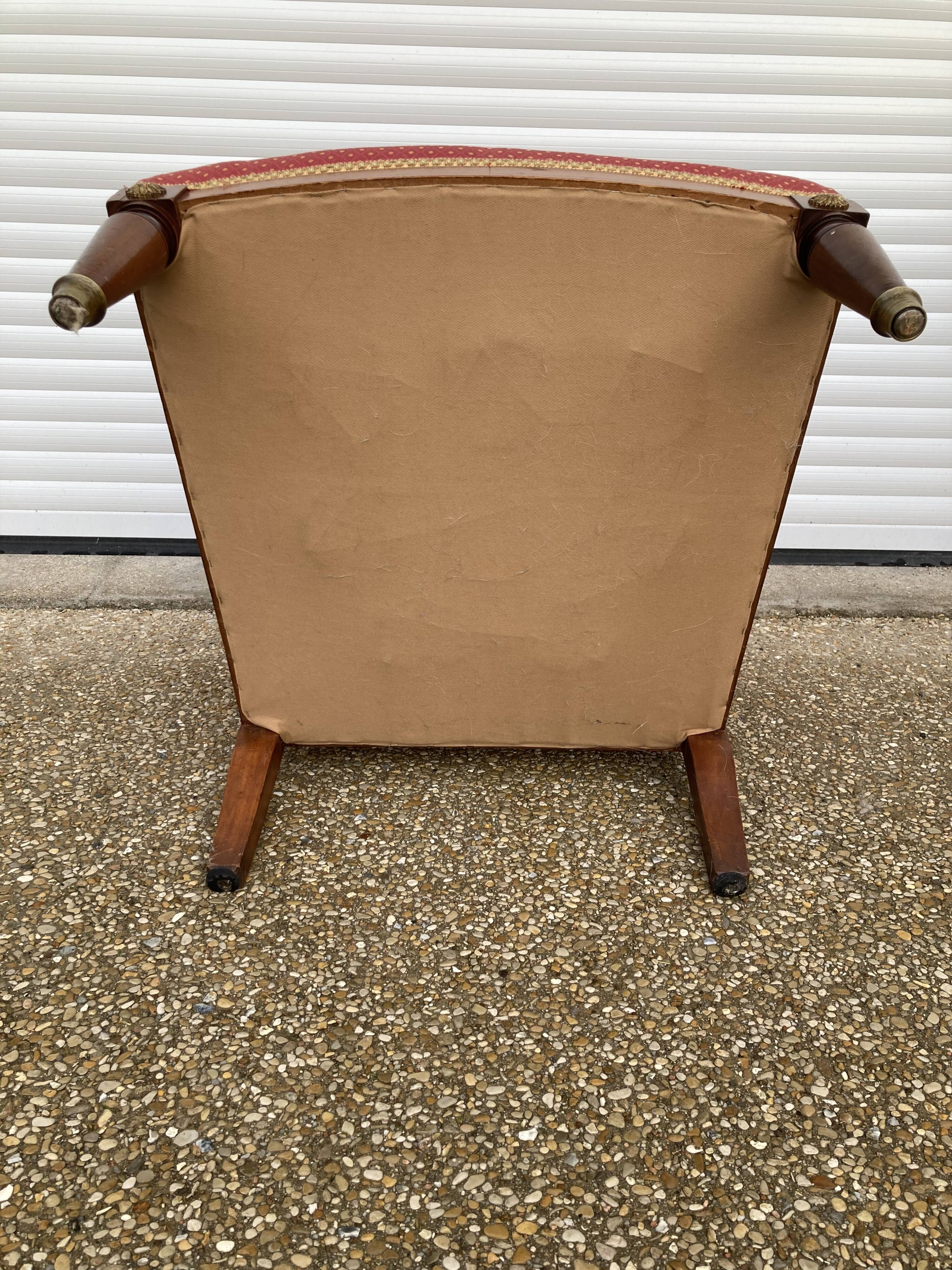 Antique upholstered armchair