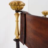 Curule armchair in wrought iron and leather