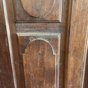France old 18th century walnut closet door. Composed of 8 finely carved panels.