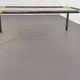 Gunmetal gold metal and smoked glass coffee table from the 70s