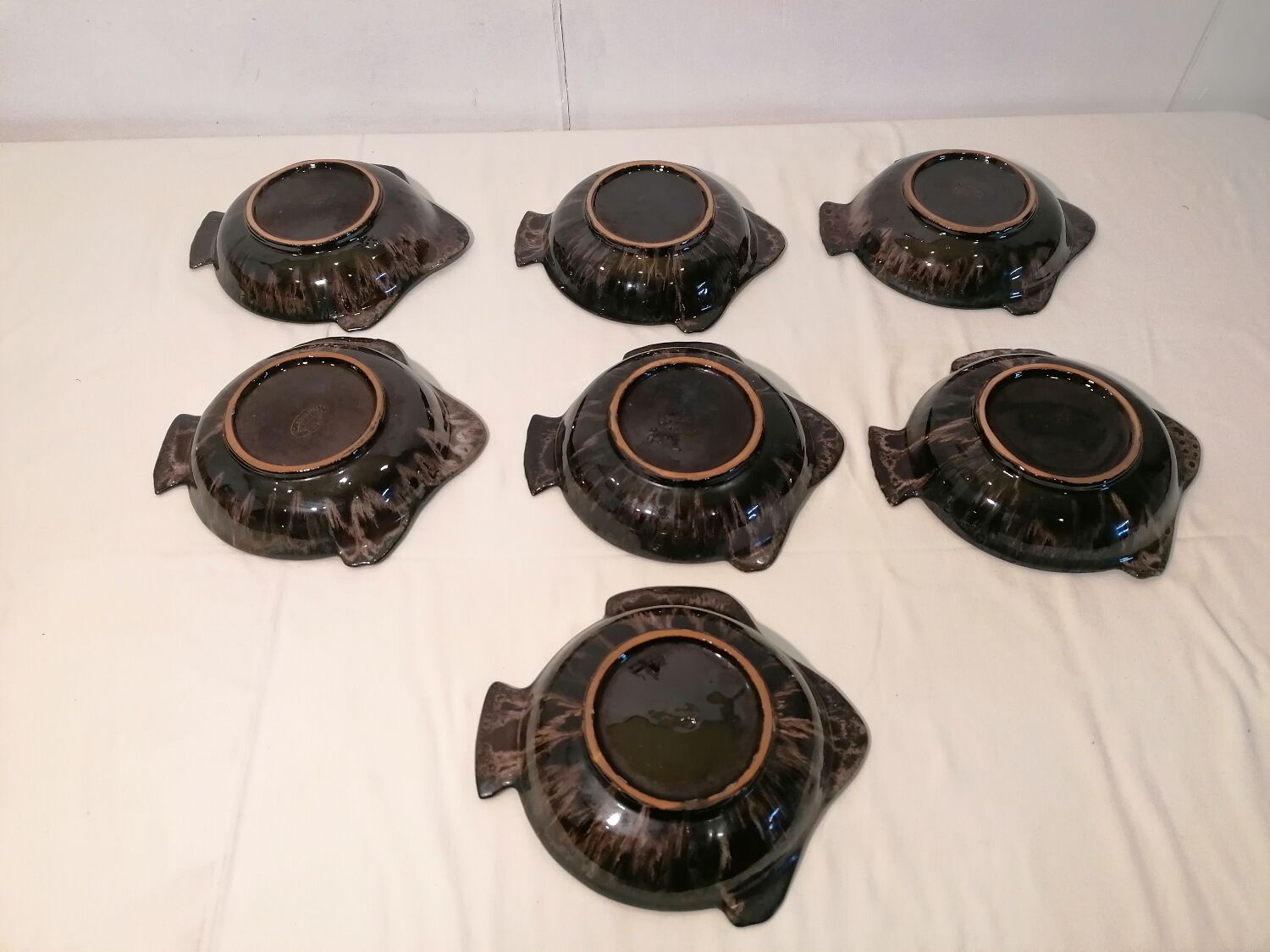 Set of 7 fish-shaped plates signed MARIUS GIUGE circa 1970