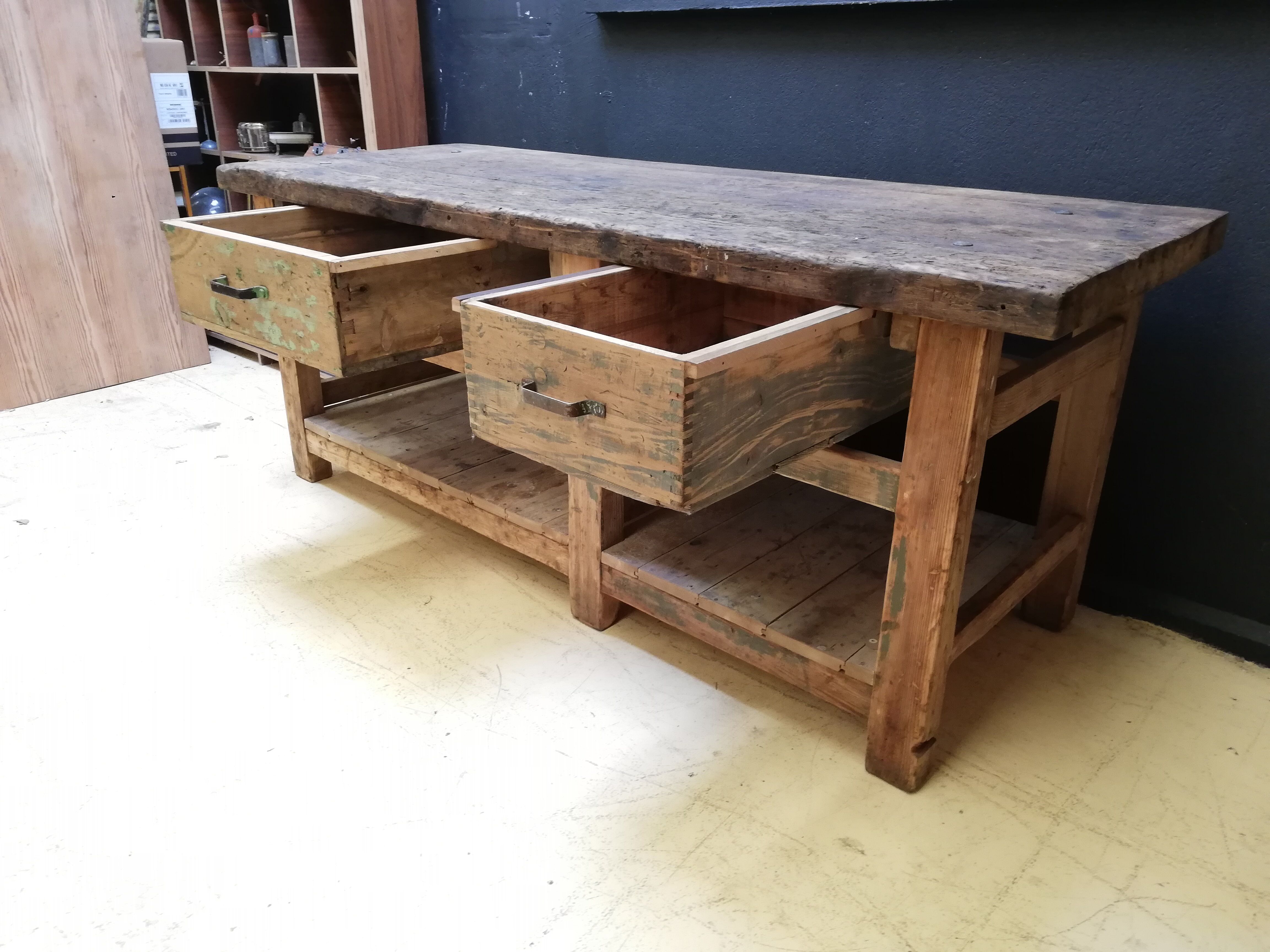 Old vintage wooden carpenter's workbench, industrial decoration