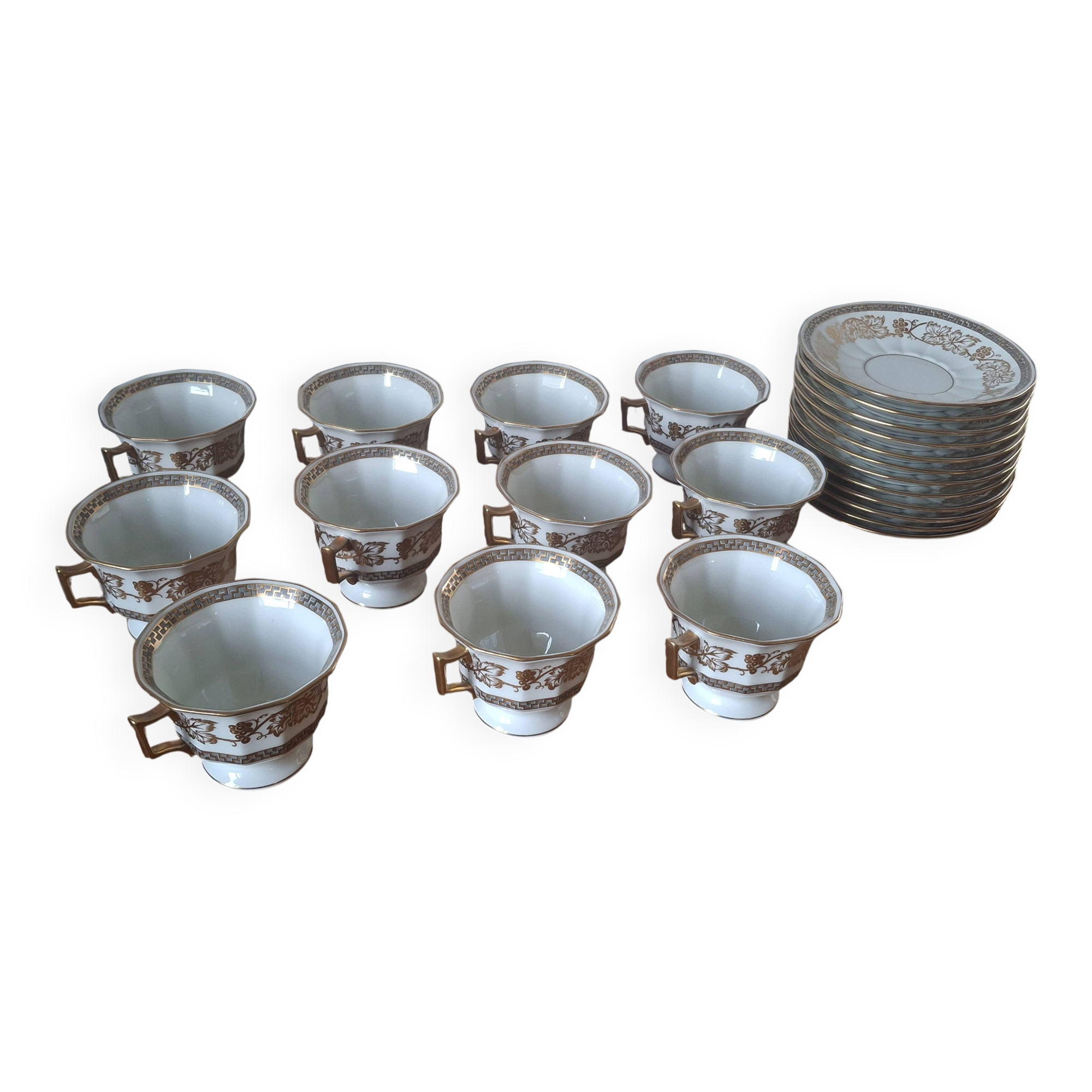 Set of 11 cups and saucers