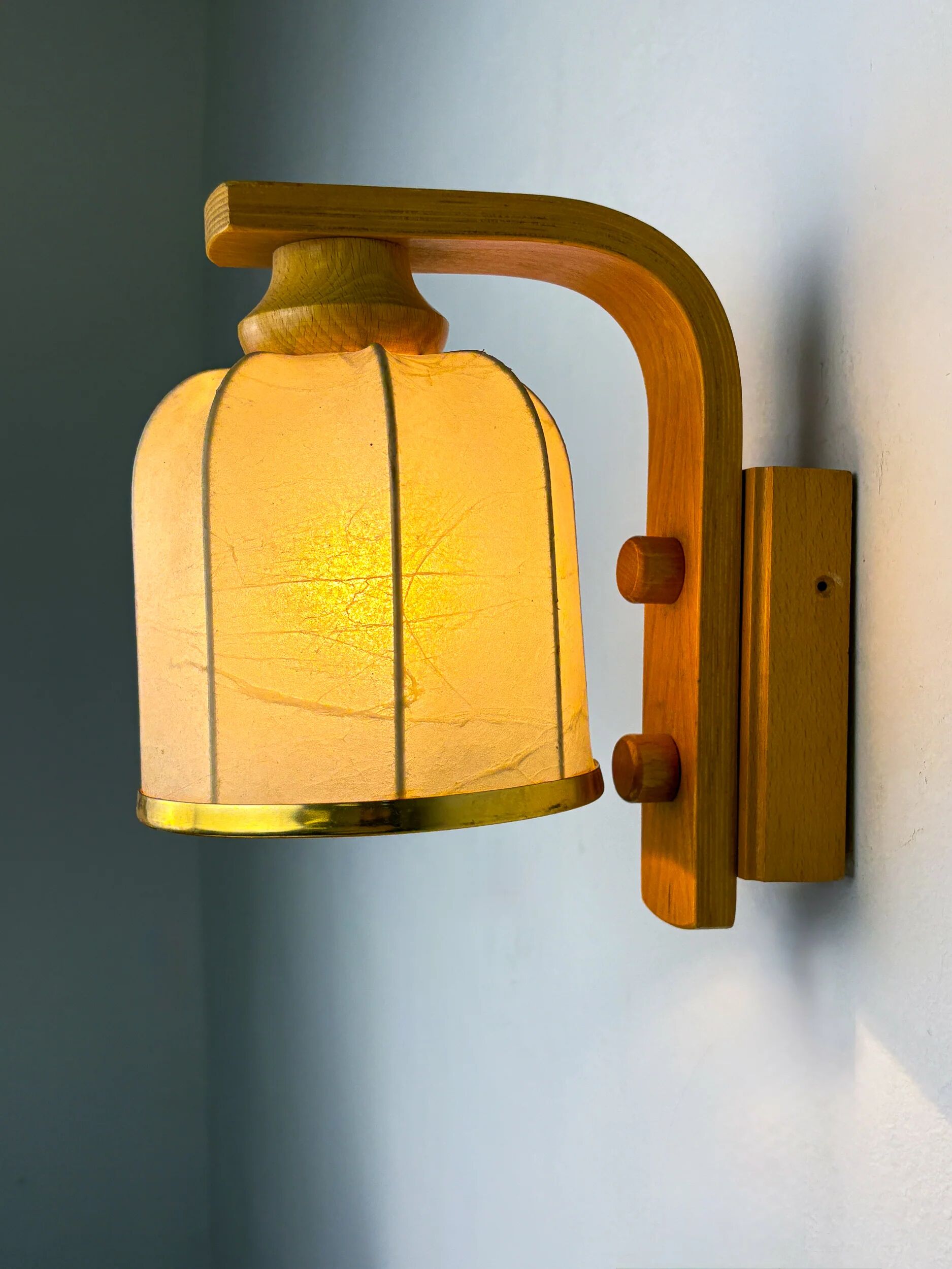 Cocoon wall lamp, resin and pine, Italy, Circa 1970's