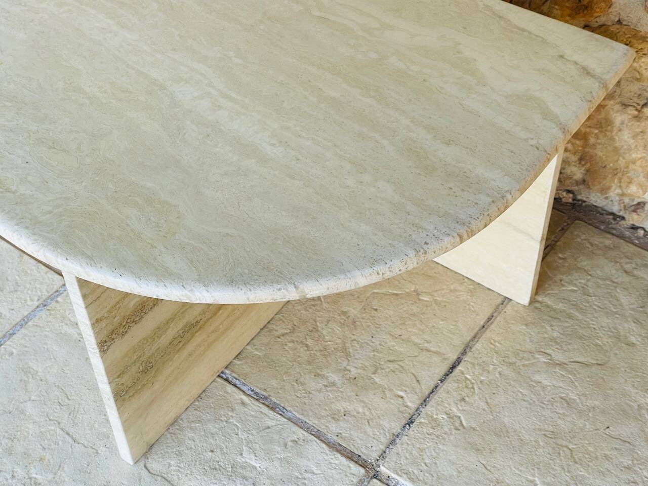 Vintage side table in travertine, circa 1980s.