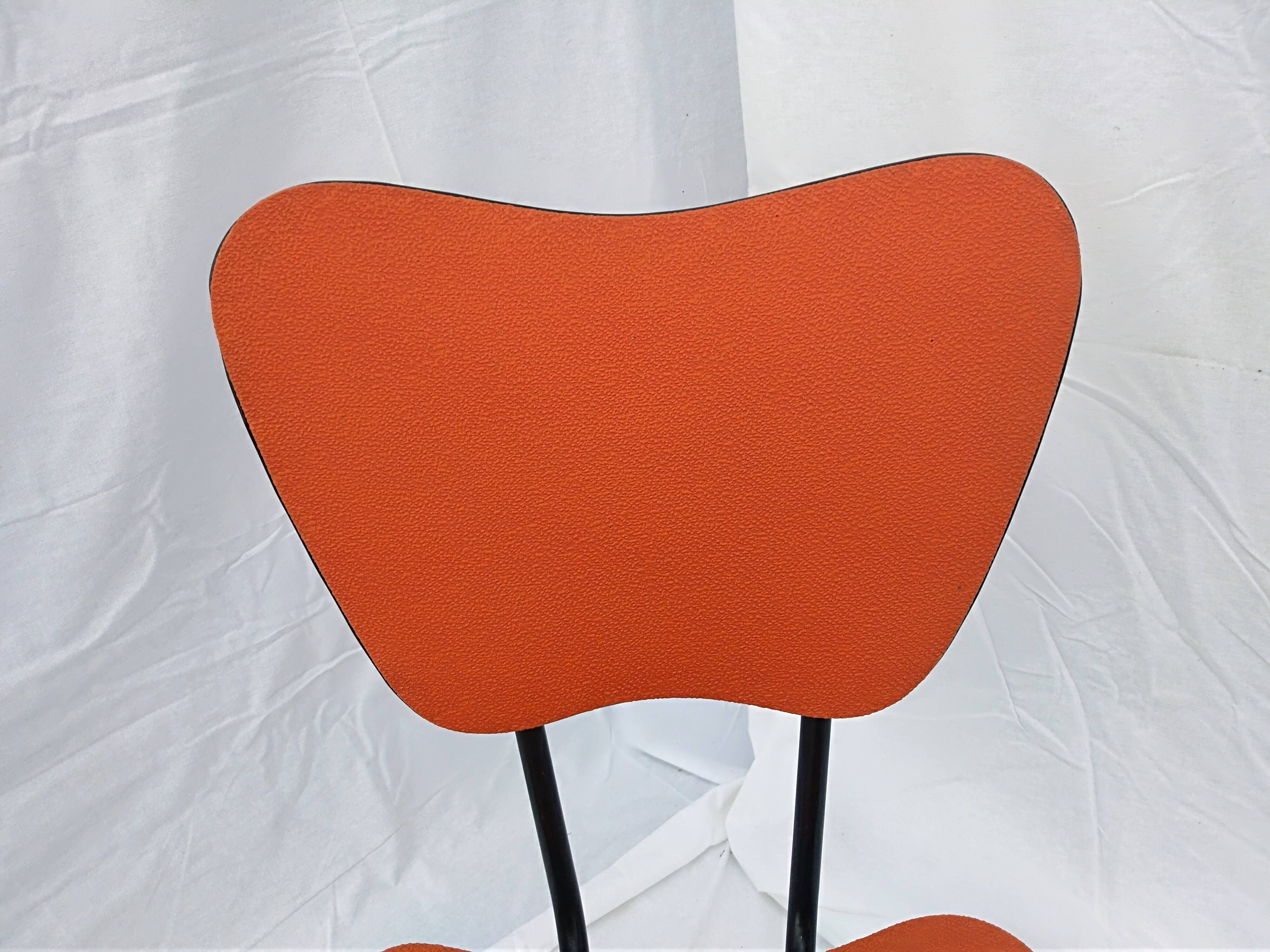 Pair of 60s chairs with skai covering