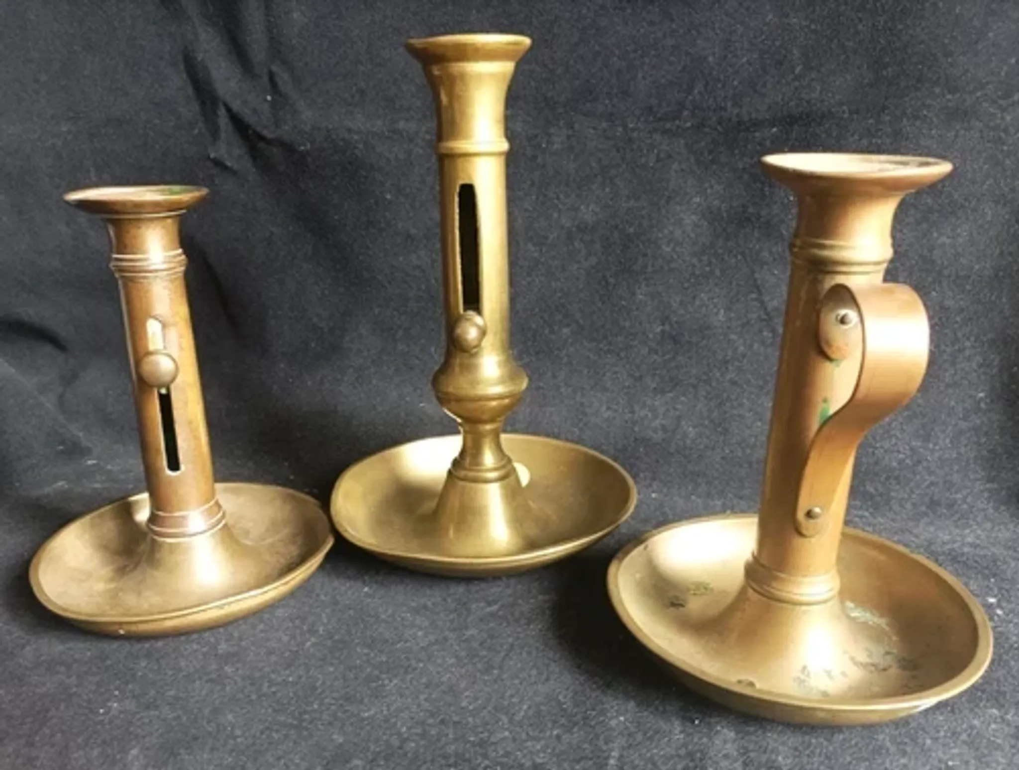 Set of 3 antique push-button bronze candlesticks from the Napoleonic III era.