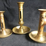 Set of 3 antique push-button bronze candlesticks from the Napoleonic III era.