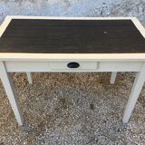 Table/desk with beige patinated square legs and black top
