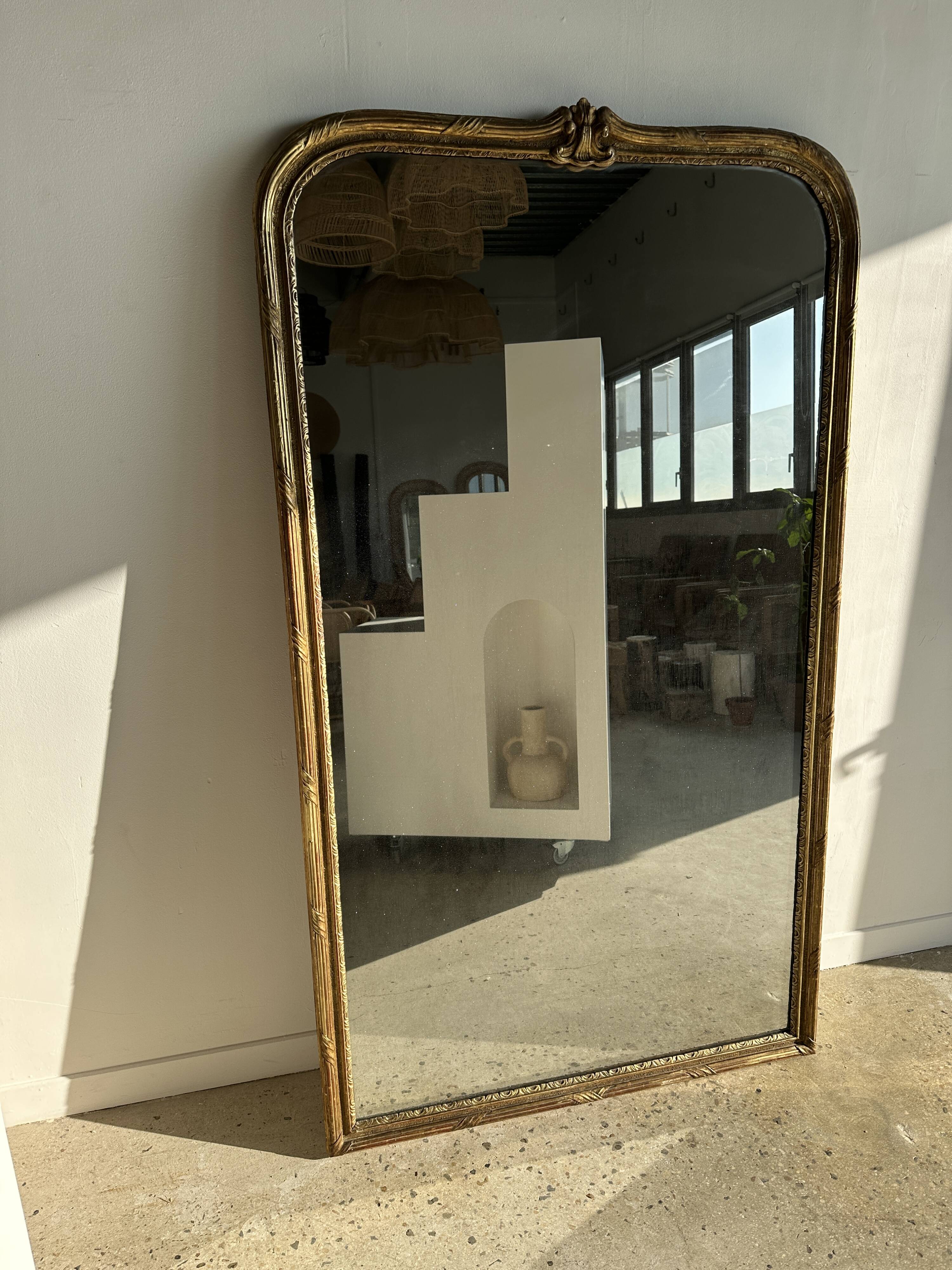 Large gilded mirror 19th century rounded corners mercury glass Louis XVI style