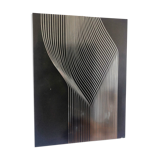 Vintage kinetic table on stainless steel plate