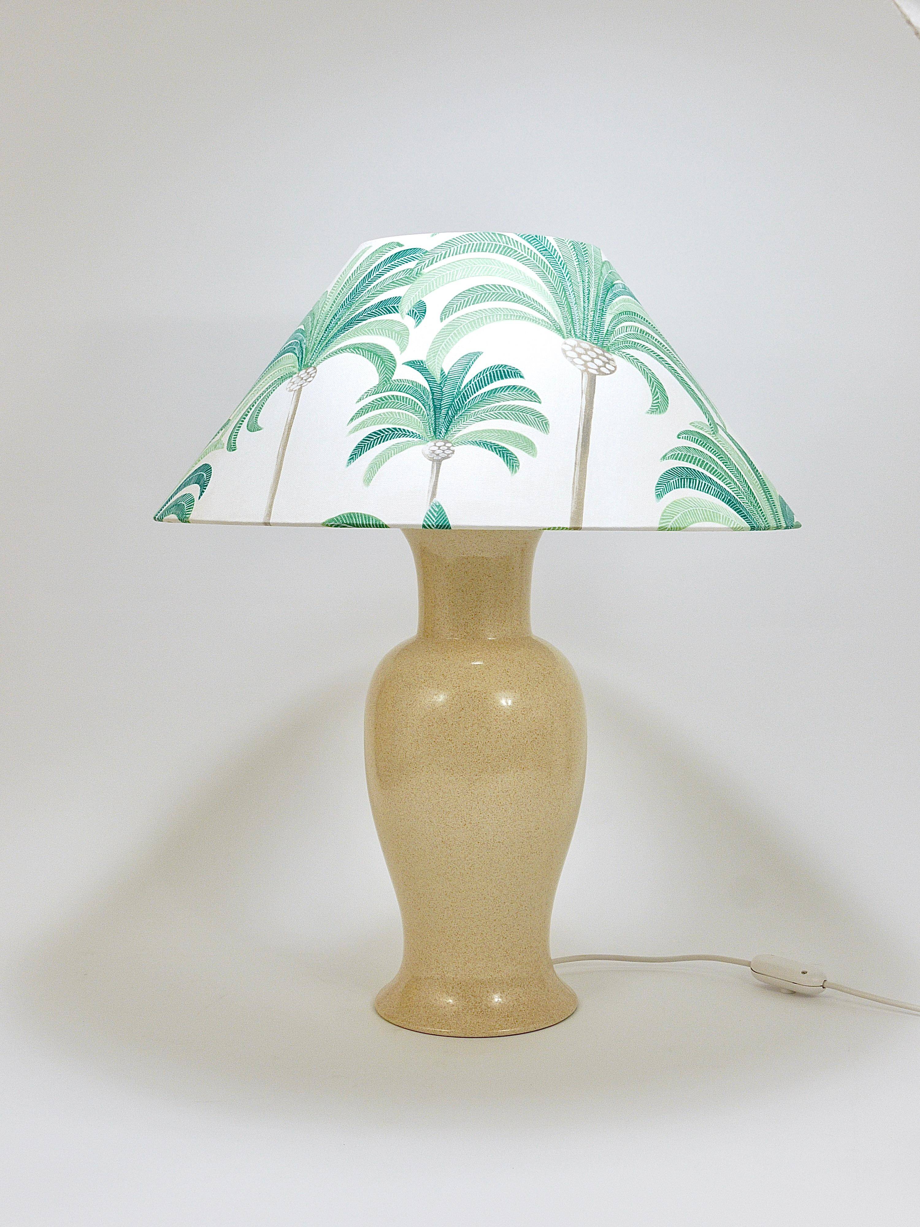 Pair of Tommaso Barbi Riviera palm tree table lamps from the 1970s with matching cushions.