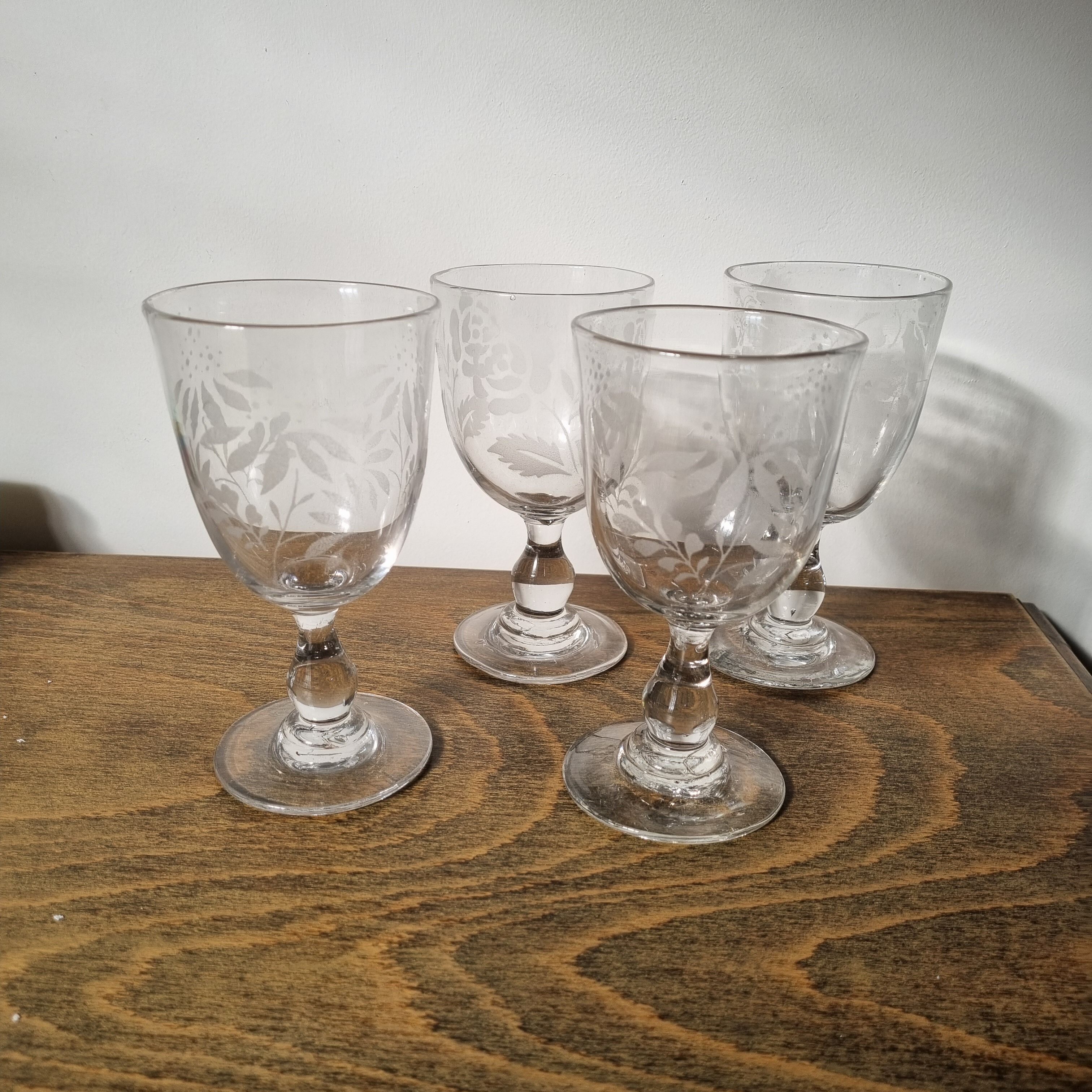 Antique hand-blown and engraved stemmed glasses