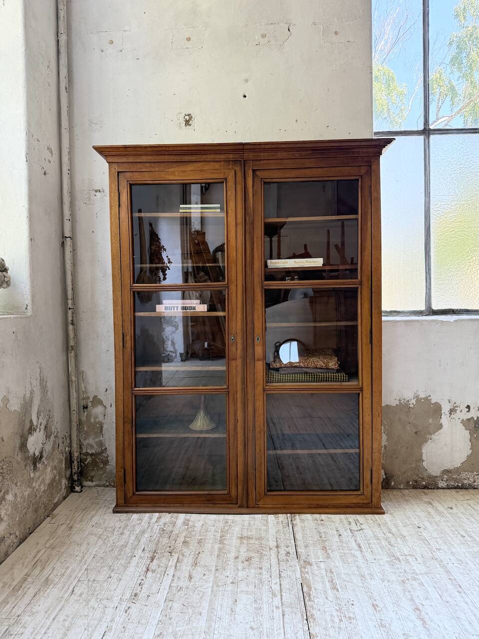 Glass-fronted walnut library 1900