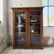 Glass-fronted walnut library 1900