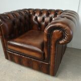Brown leather chesterfield armchair