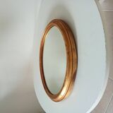 Antique oval mirror in gilded solid wood