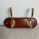 Brass and wood wall hook