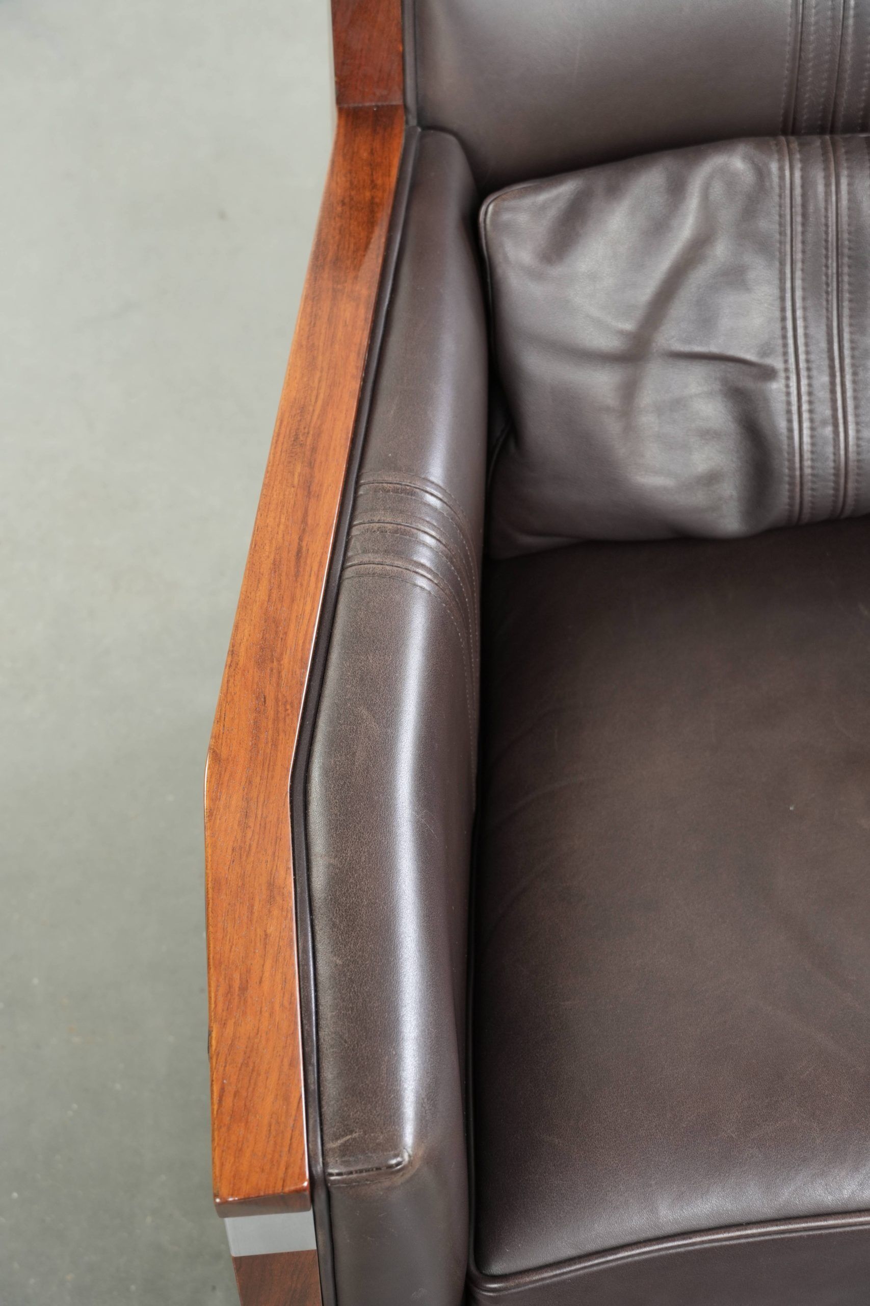 Art Deco design set consisting of an armchair and ottoman