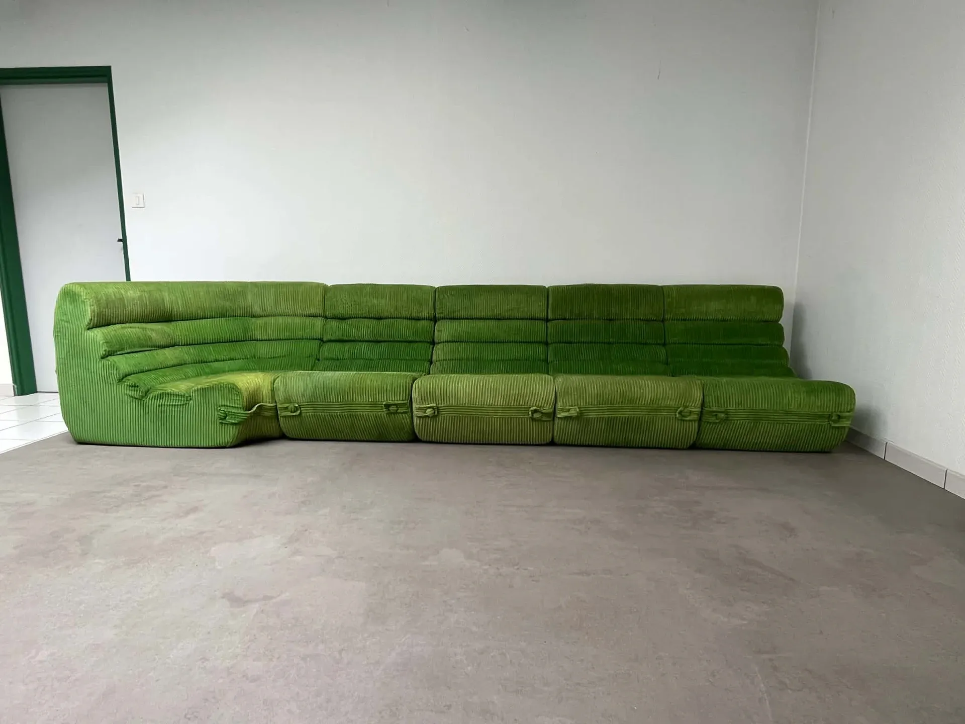 Modular green velvet corner sofa, 1970s