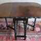 Antique farmhouse patinated extendable table in oak with carved edge, 1900