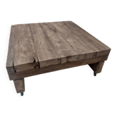 Coffee table made of solid oak beams – handcrafted.
