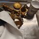 Pair of neoclassical candle holders in gilded bronze and green onyx, bust of