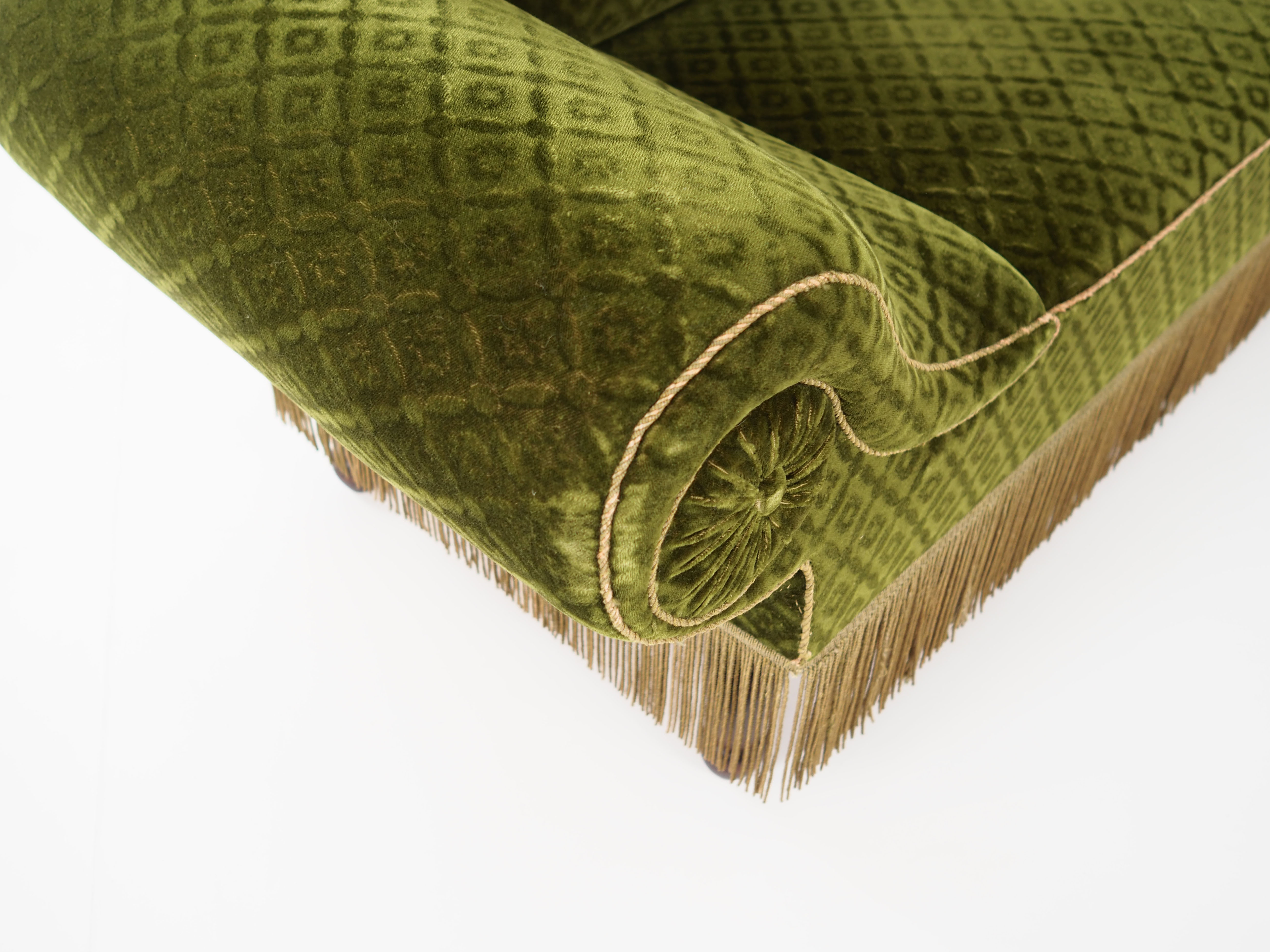 Antique sofa-bed in green colour