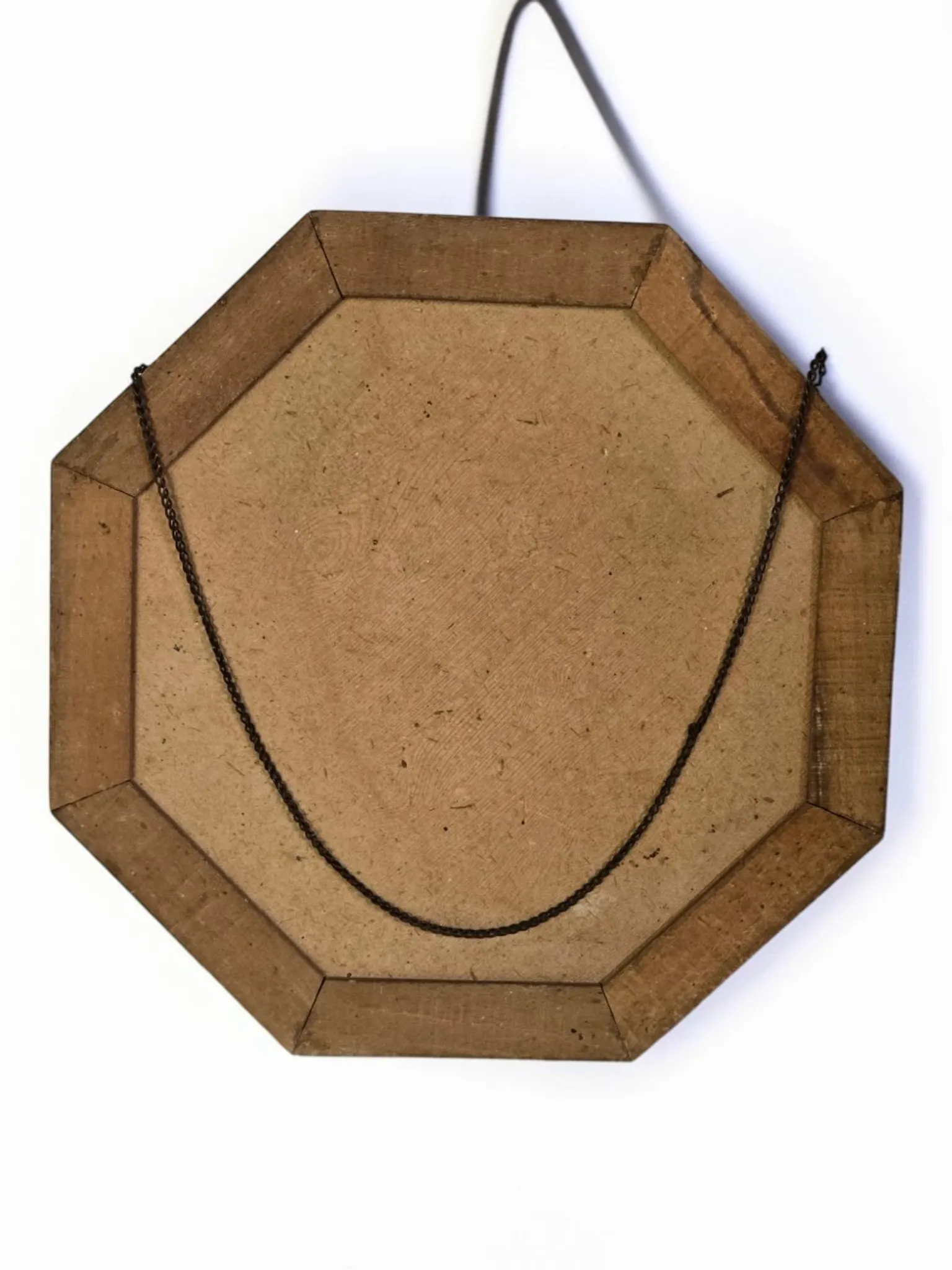 Octagonal mirror in carved wood