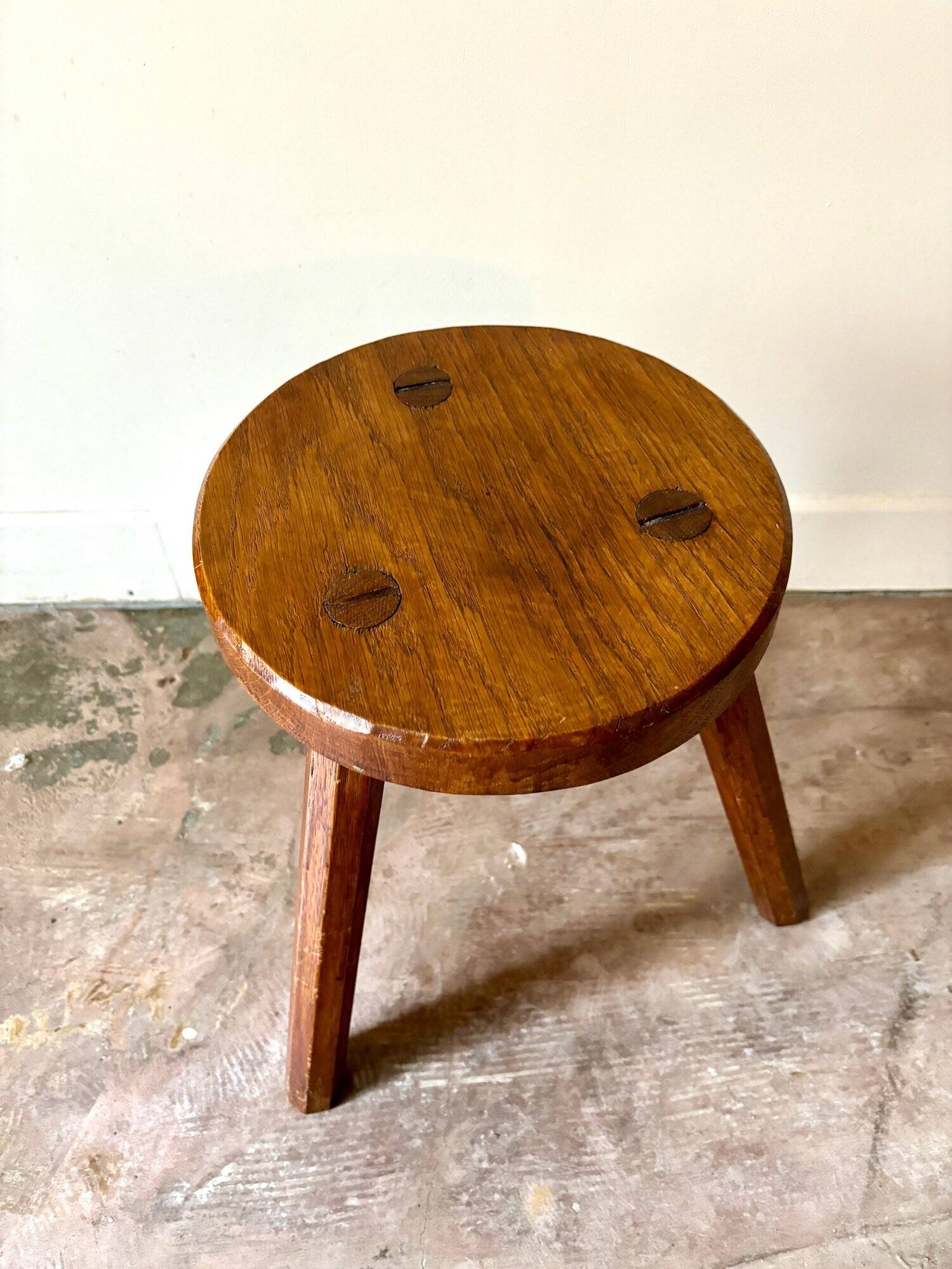 Dark wood tripod stool