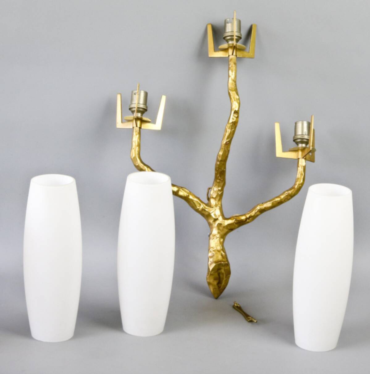 Pair of wall lights by Maison Arlus by Felix Agostini in bronze.