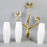 Pair of wall lights by Maison Arlus by Felix Agostini in bronze.