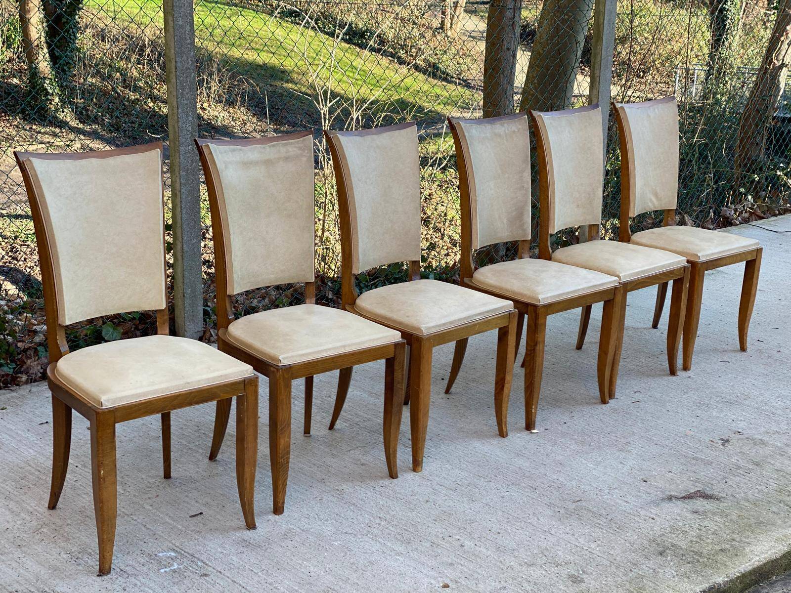 6 Italian Scandinavian style dining chairs from the 1950s in wood and leather.