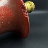 Lamp base in reconstituted stone, red "oxblood", 20th century