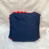 Vintage cushion red pompoms