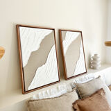 Diptych relief panels in linen and white.