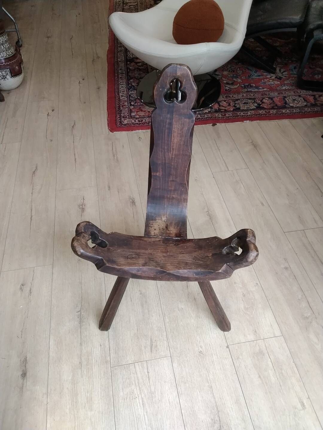 Rustic wooden tripod chair