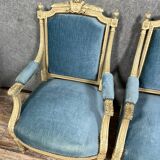 Pair of Louis XVI style armchairs in molded, carved wood
