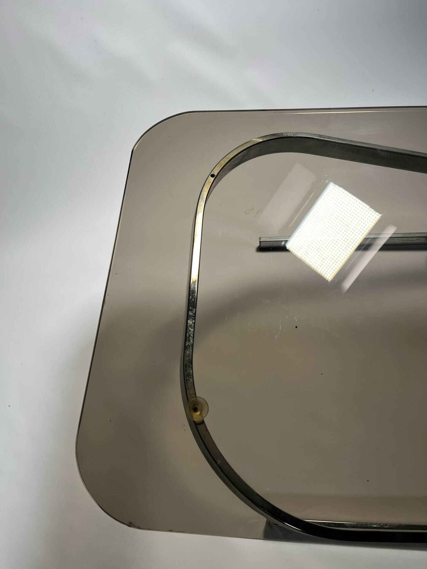 Vintage coffee table in chrome and smoked glass, 1970s.